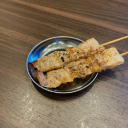 Pork belly skewer or green onion skewer