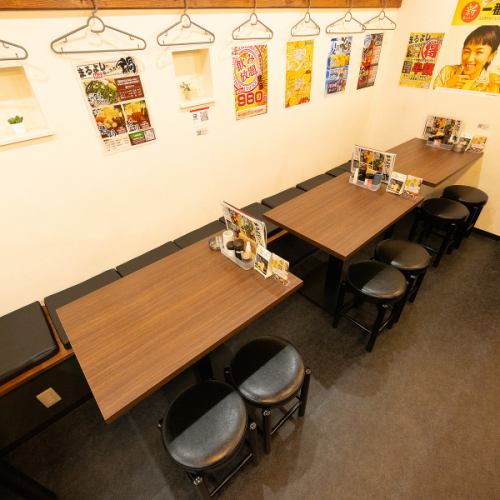 4 people x 3 sofa seats on one side