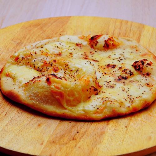 Dessert pizza with mozzarella and honey
