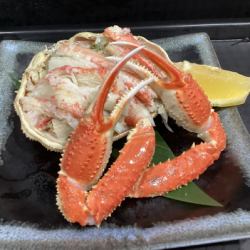 The box is decorated with crab-like