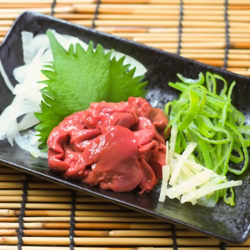 Chicken liver topped with green onions