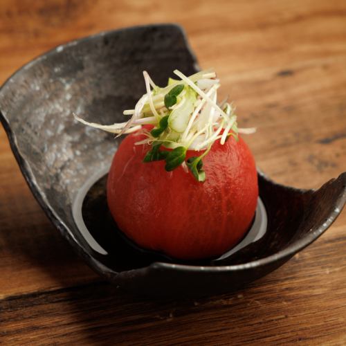 Whole tomatoes marinated in dashi broth