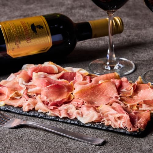 Freshly sliced prosciutto crudo