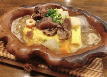 Boiled beef tendon soup stock and cooked egg