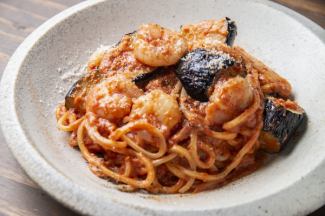 Shrimp and fried eggplant in tomato cream sauce