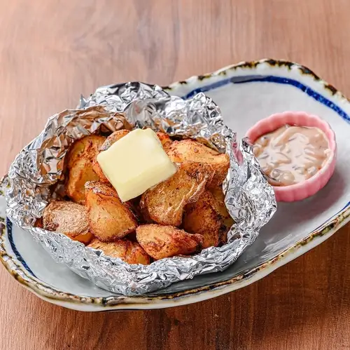 Deep-fried potatoes with butter