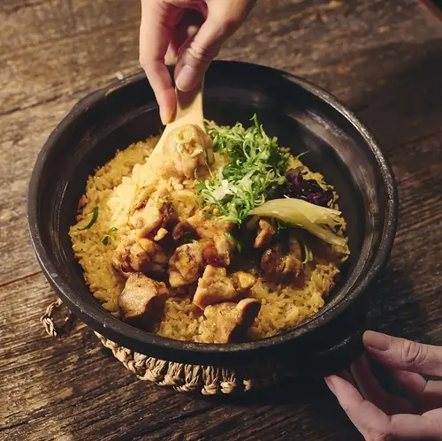Clay pot rice with Shiretoko chicken, Kujo leeks, and fresh ginger
