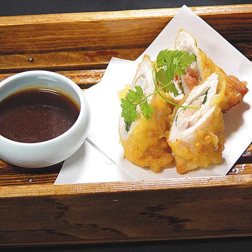 Chicken fillet and cod roe wrapped in plum and shiso leaves