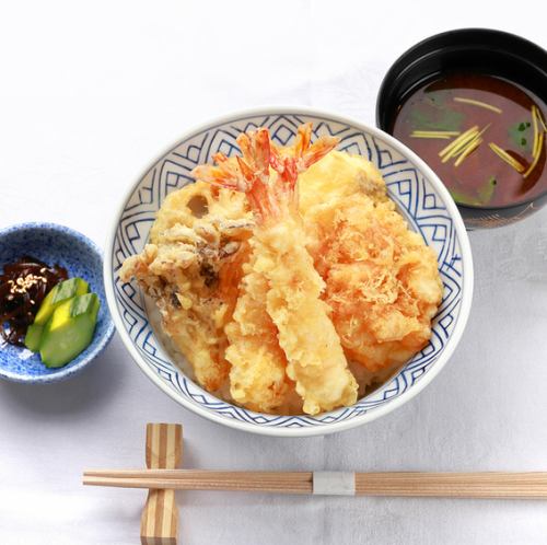 Bowl of rice and fried fish