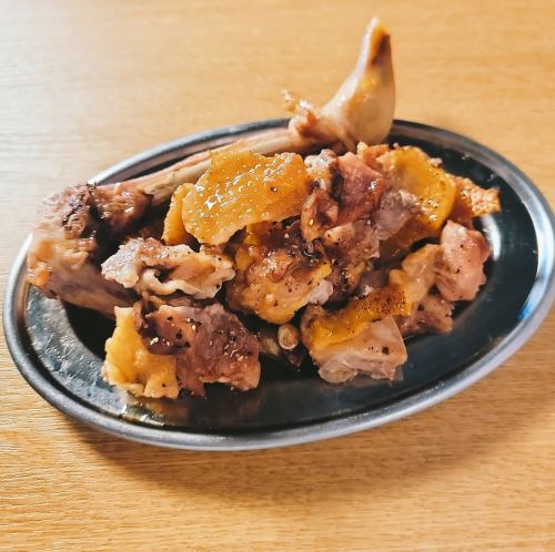Chicken with bones grilled in oil