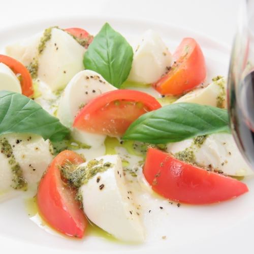 Caprese with fruit tomatoes and fresh mozzarella