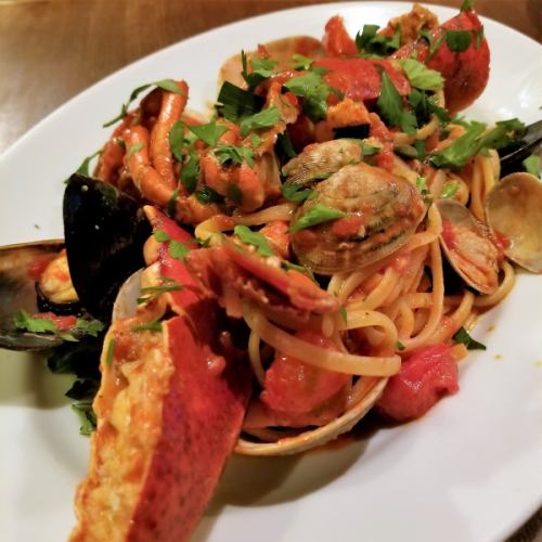 Vacanza's specialty! Whole lobster and seasonal shellfish tomato sauce, linguine ~ Pescatore ~