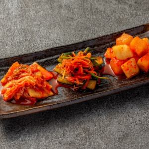 Three kinds of kimchi served