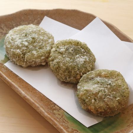 Deep-fried oden radish with green lettuce