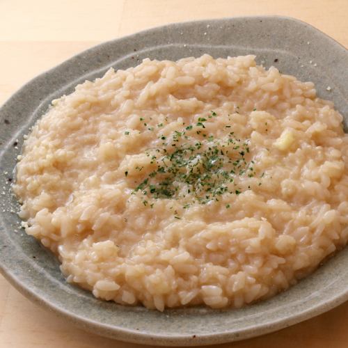 Cheese risotto served with oden