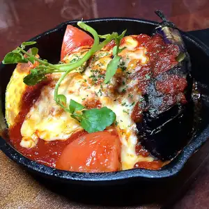 Cheese and tomato stewed hamburger steak