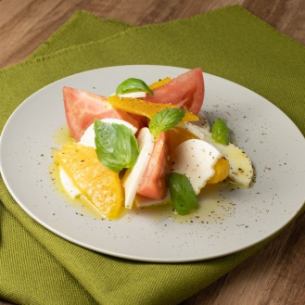 Zao mozzarella and seasonal fruit caprese