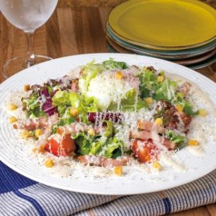 Caesar salad with freshly grated Grana Padano cheese