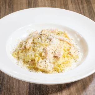 Carbonara: Rich carbonara made with freshly grated Grana Padano cheese