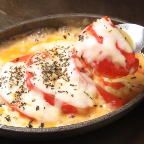 Tomato and melted cheese