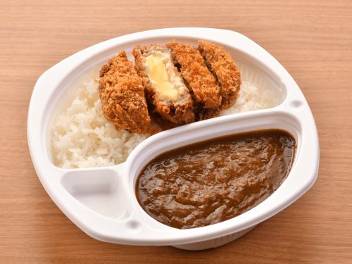 Various types of cheese in minced meat curry