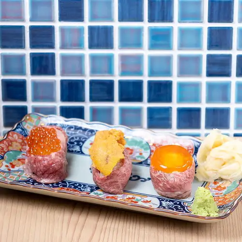 Enjoy a visually stunning and exquisite assortment of three types of meat sushi!