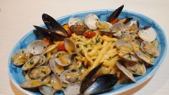 Homemade fresh pasta "Troccoli" with three kinds of shellfish oil sauce