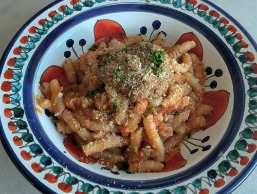 [Busciate] Calabrian raw whitebait pickled in chili peppers and red onions in a spicy tomato sauce served with molica