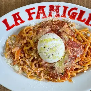 Pasta with tomato sauce and burrata cheese
