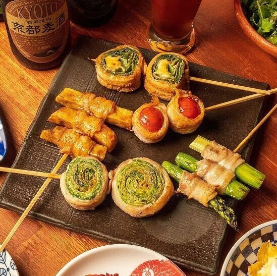 A new Kyoto-style skewer creation, featuring Kyoto vegetables, meat-wrapped skewers, and seafood skewers grilled over charcoal in a Kyoto townhouse in Pontocho.