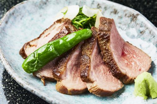 Grilled French Magure duck with rock salt