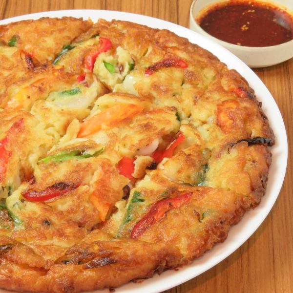 Extremely delicious seafood pancake with special sauce