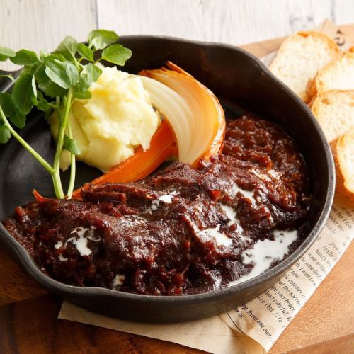 Beer-braised beef tongue served with baguette