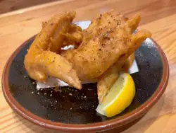 Three deep-fried chicken wings