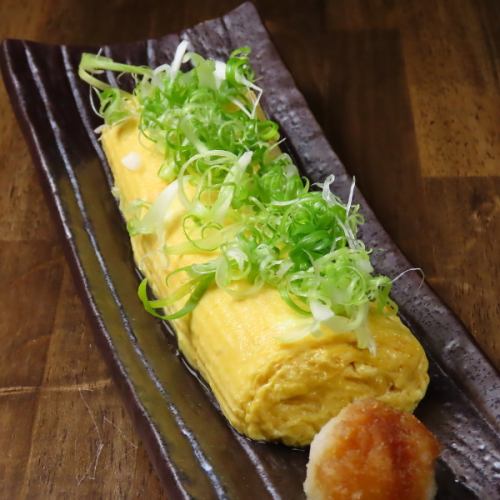 Rolled egg with green onion