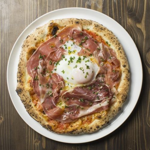 Bismarck pizza with soft-boiled eggs and prosciutto
