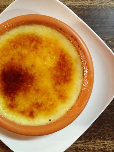 Spanish pudding with vanilla ice cream