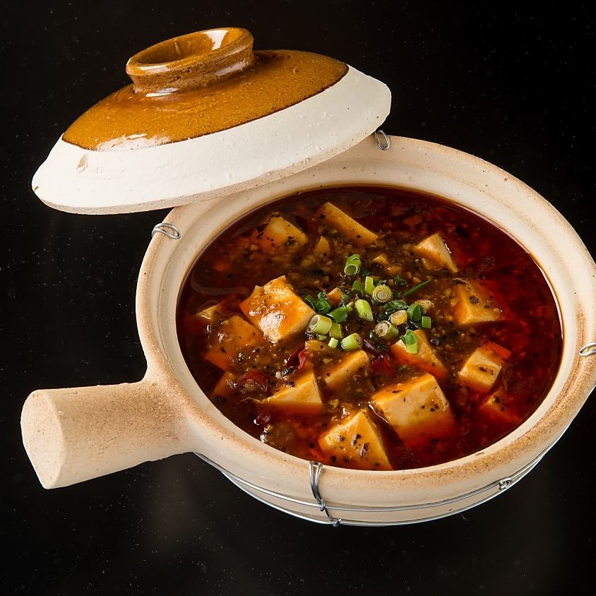 Enjoy authentic Chinese food such as mapo tofu, which is spicy and numb.