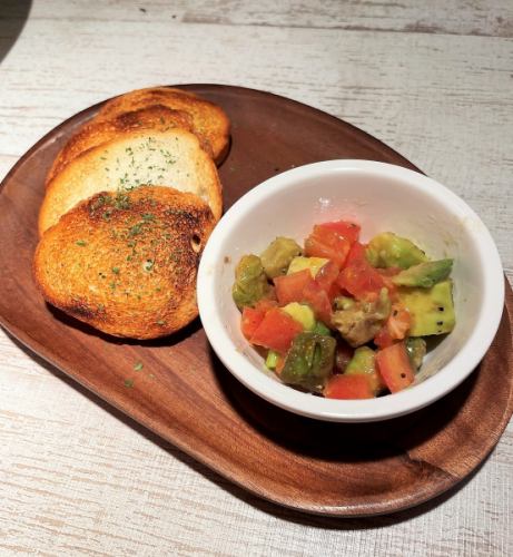 Bruschetta with tomato and avocado
