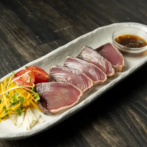 Seared bonito with homemade green chili ponzu sauce