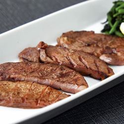 Thickly sliced seared beef tongue