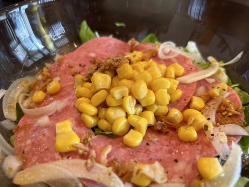 Japanese-style salad with plenty of corn and beer sausage