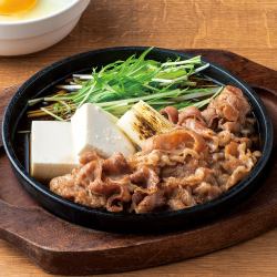 Beef sukiyaki on a hot plate