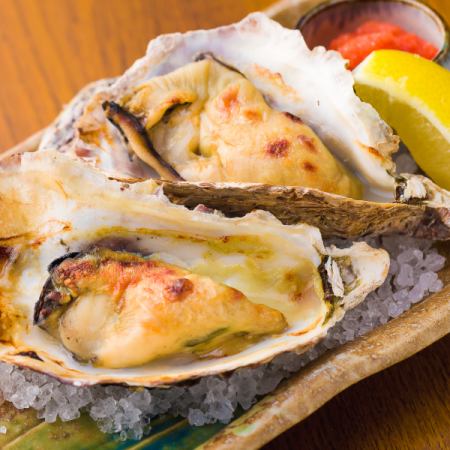 1 grilled oyster with grated maple leaves and lemon