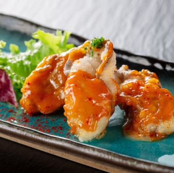 Spicy fried oysters with red mayonnaise sauce