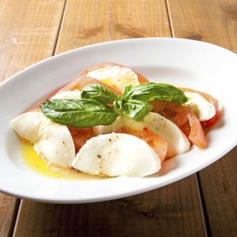 Caprese with mozzarella cheese and fresh tomatoes