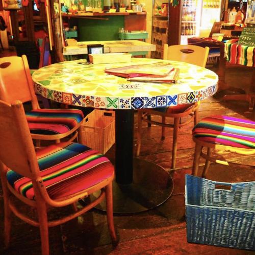 Round table seats using Mexican tiles