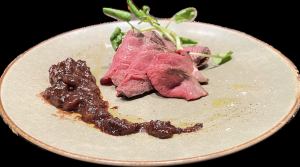 Cold roasted Honshu venison with chestnuts, raisins and red wine sauce