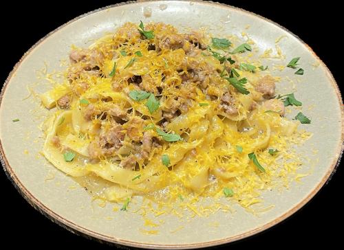 Fettuccine with pork, herbs and mushroom ragu