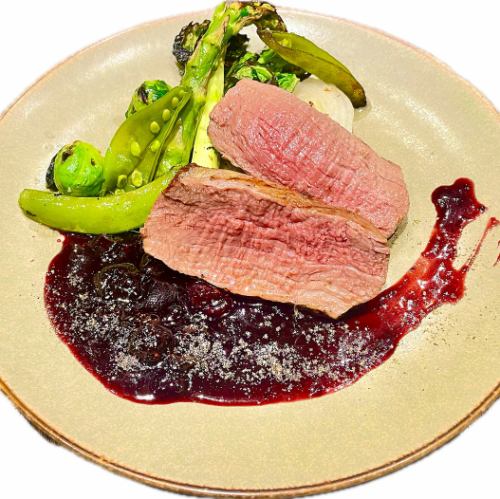 Roasted Ezo deer, spring vegetable salad, blackcurrant sauce